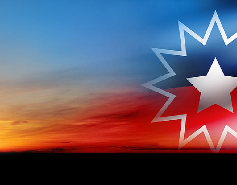 Sunset background fading into the Juneteenth flag